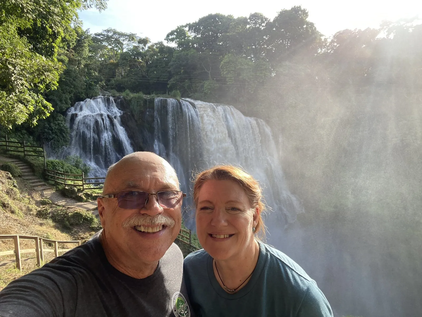 Paul, Loring, and a friend in front of Pulhapanzak waterfall in Honduras.